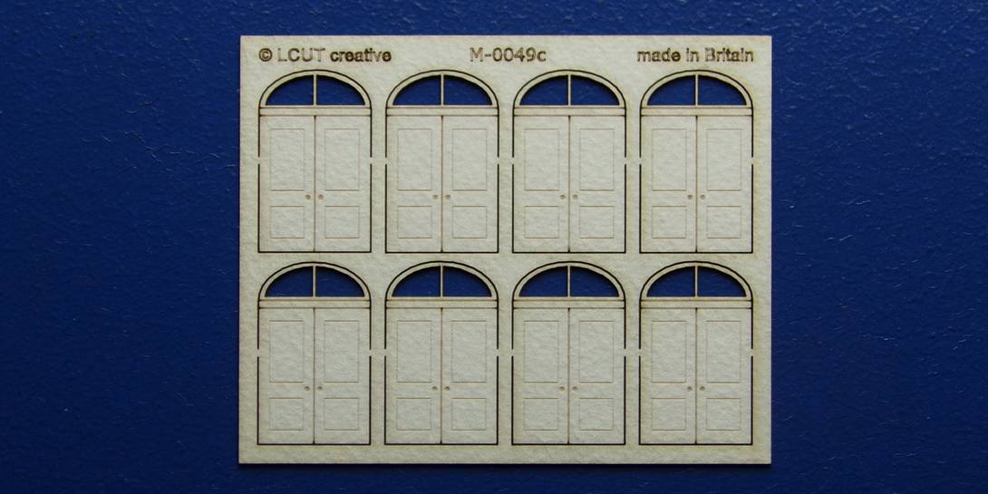 M 00-49c OO gauge kit of 8 double doors with round transom type 1 Kit of 8 double doors with round transom type 1.
